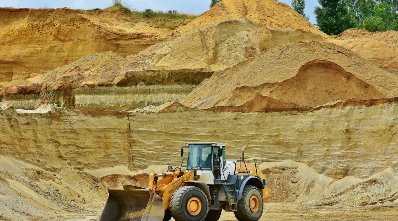 Photo of truck in a mining field